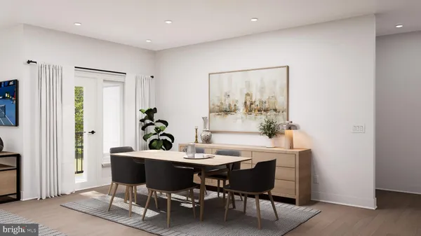a view of a dining room with furniture and window