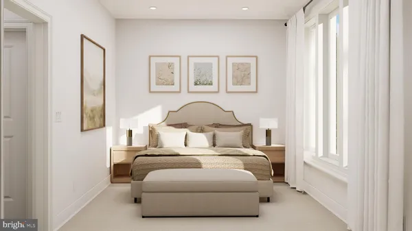 a bed room with a bed and a window