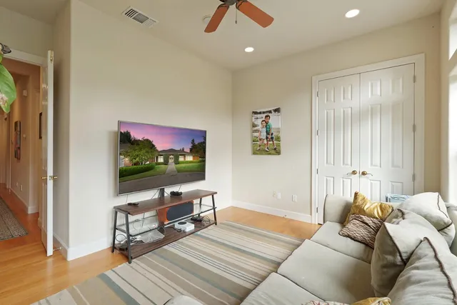 a en suite bathroom with a sink and a mirror