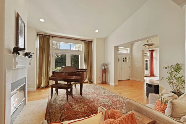 a view of a dining room with furniture wooden floor and chandelier