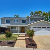 front view of house with a yard