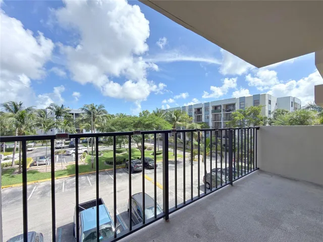 a white refrigerator freezer sitting in a kitchen