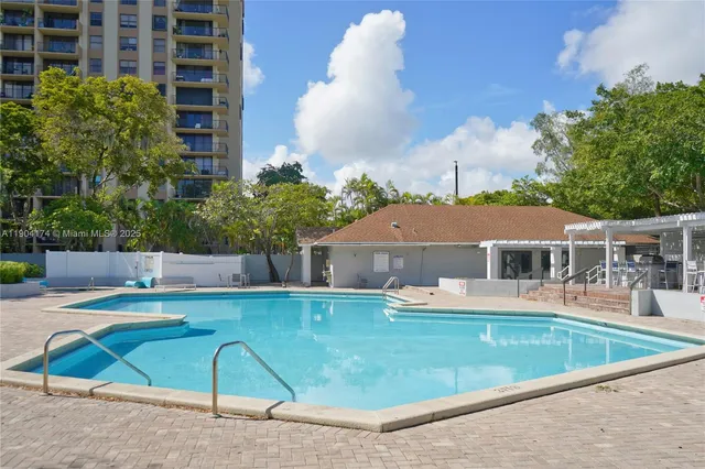 a view of a house with swimming pool