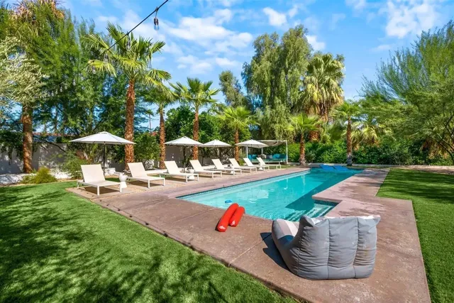 a view of a backyard with a patio