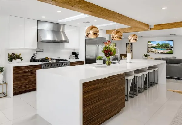 a kitchen with a sink and cabinets