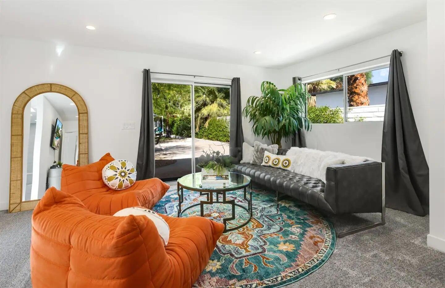 72382 Desert Drive Rancho Mirage, CA 92270 - Photo 32 of 45 a living room with furniture and a large window
