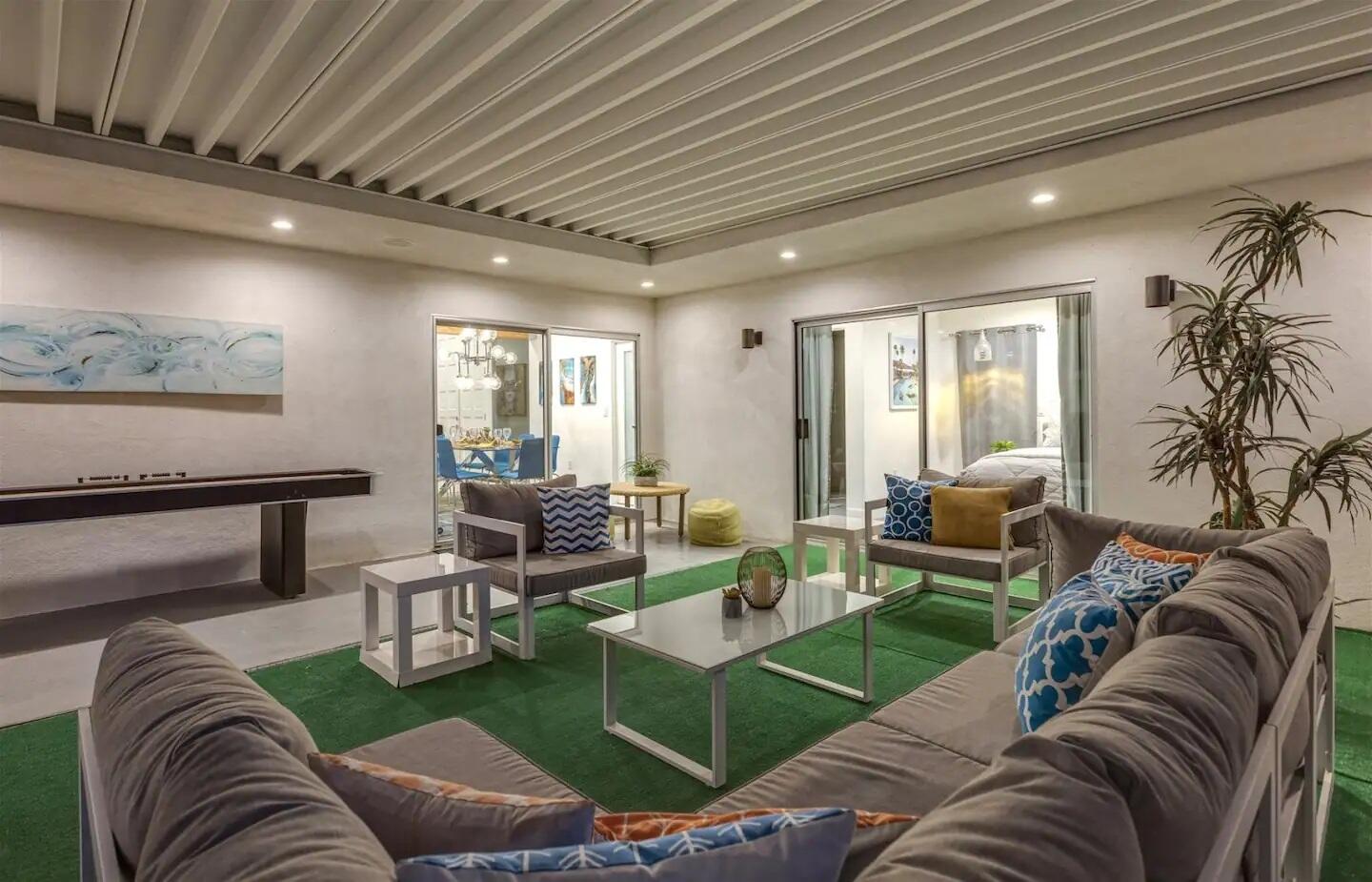 72382 Desert Drive Rancho Mirage, CA 92270 - Photo 40 of 45 a living room with furniture and a large window