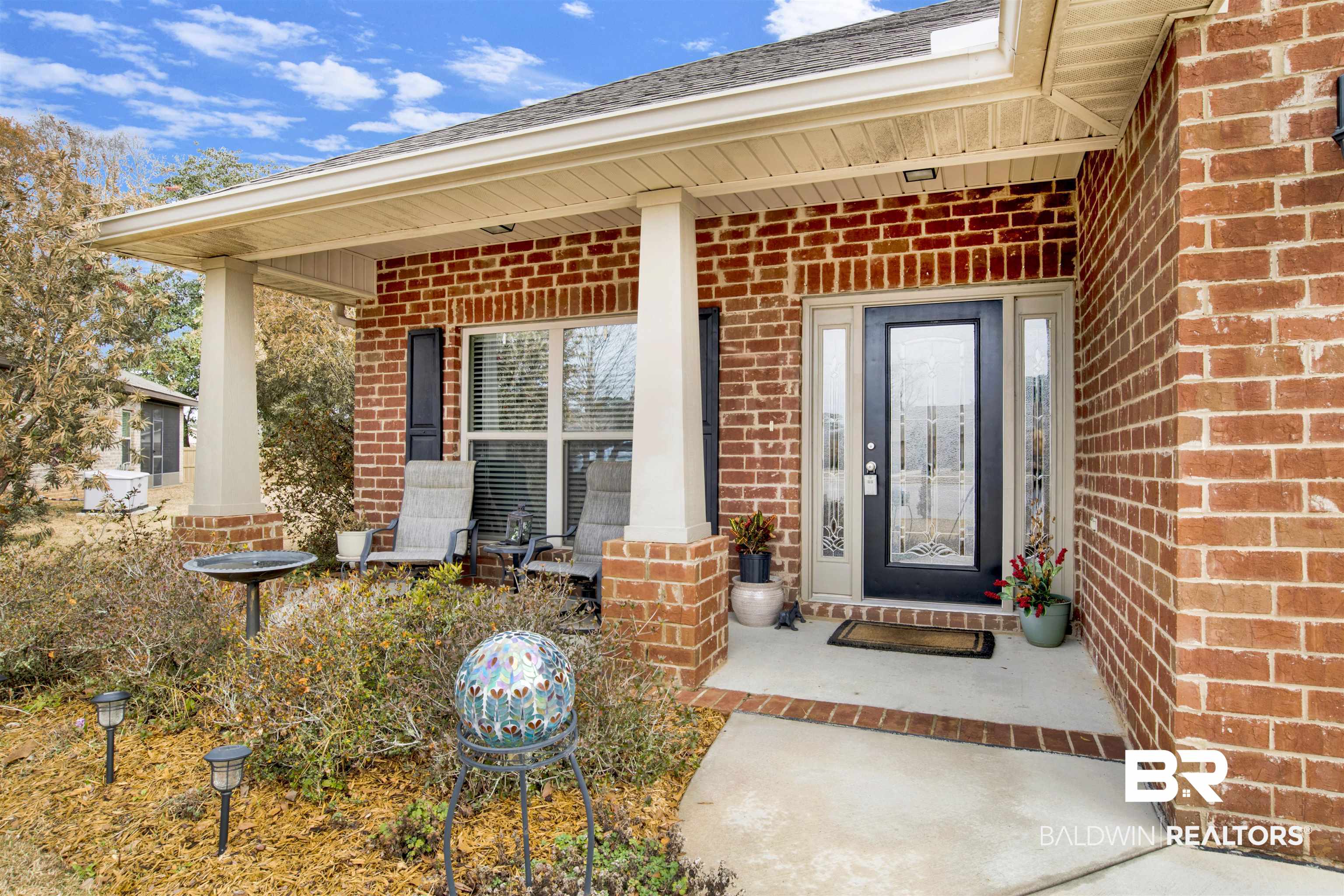 1476 Surrey Loop Foley, AL 36535 - Photo 4 of 31 Property entrance featuring a porch