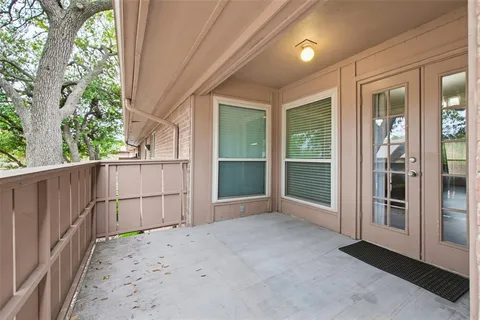 a view of a room with a large window