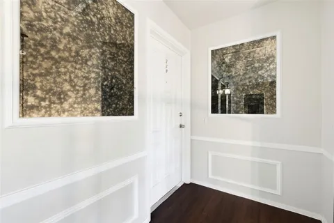 a bathroom with a bathtub and a window