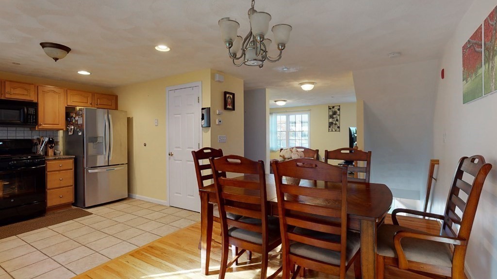 81 Salem Road, Unit 92 Billerica, MA 01821 - Photo 12 of 32 a view of a dining room with furniture