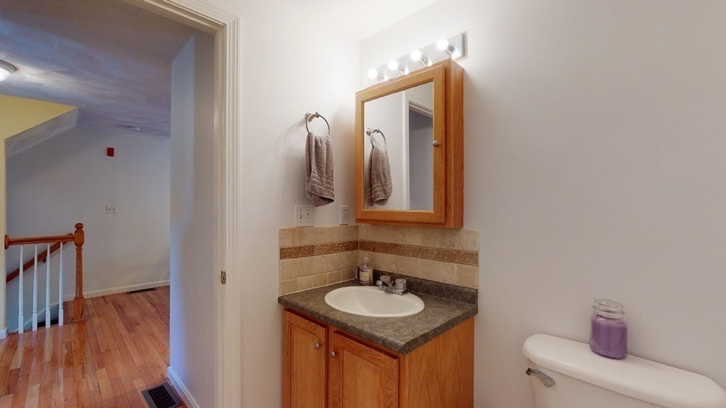 81 Salem Road, Unit 92 Billerica, MA 01821 - Photo 16 of 32 a bathroom with a sink and a mirror