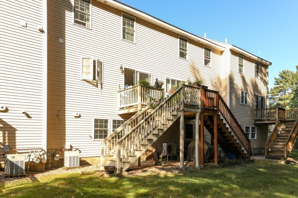81 Salem Road, Unit 92 Billerica, MA 01821 - Photo 29 of 32 a view of a house with a swimming pool