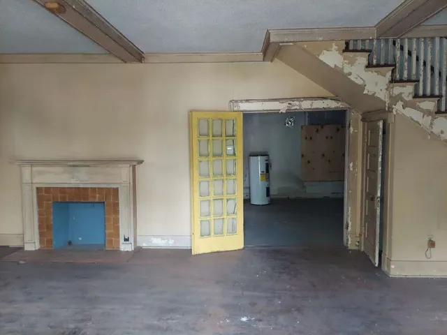 a view of a livingroom with a fireplace