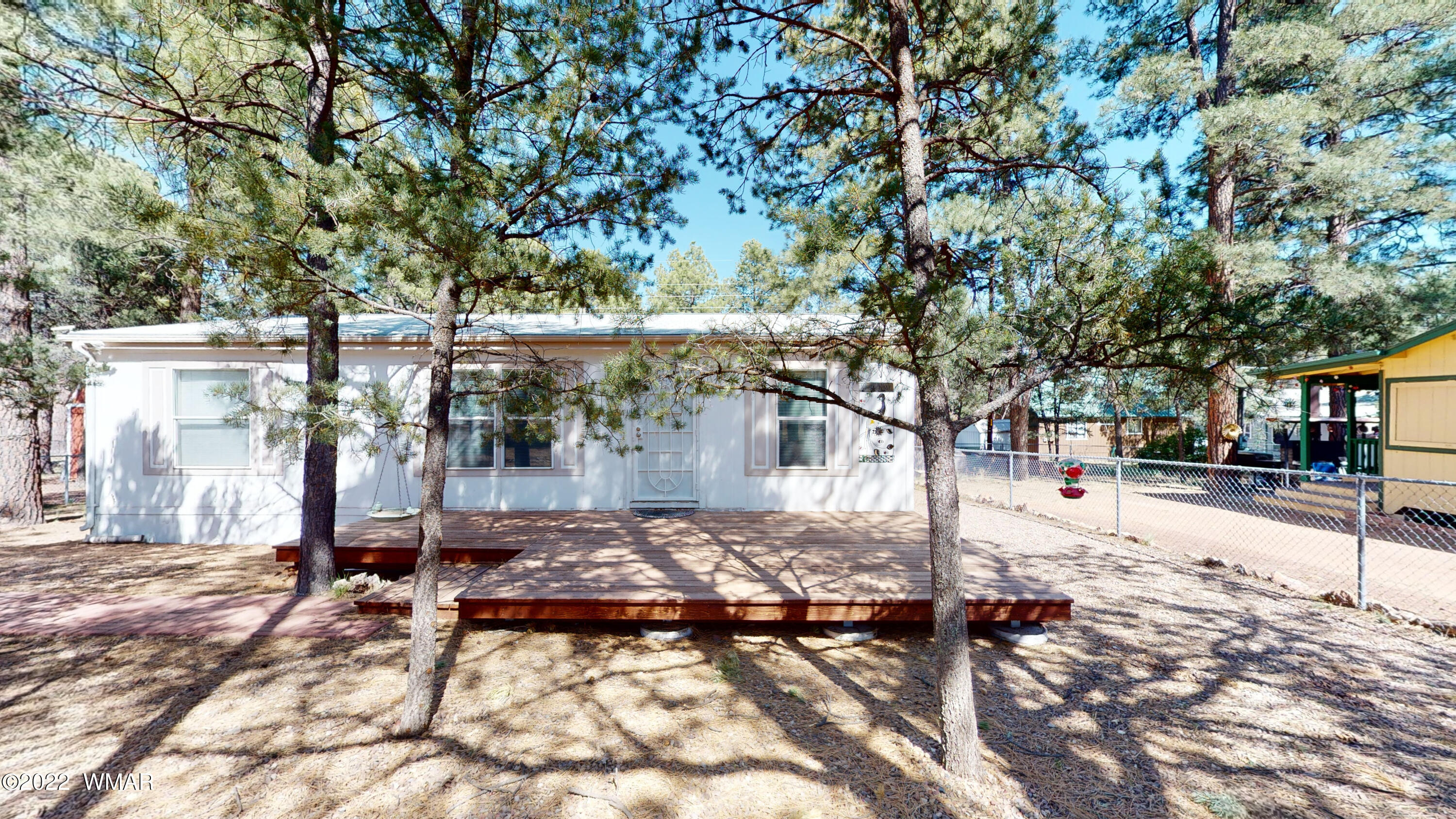 2957 Hunters Road Overgaard, AZ 85933 - Photo 8 of 25 a view of a yard with a tree