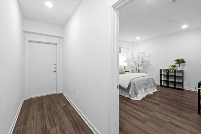 a bedroom with a bed and closet