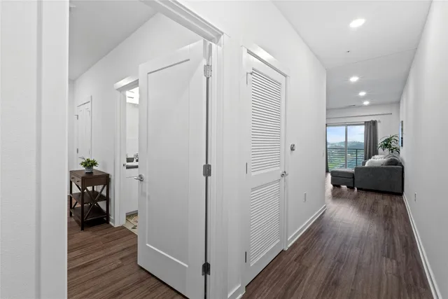a view of a livingroom with furniture and wooden floor