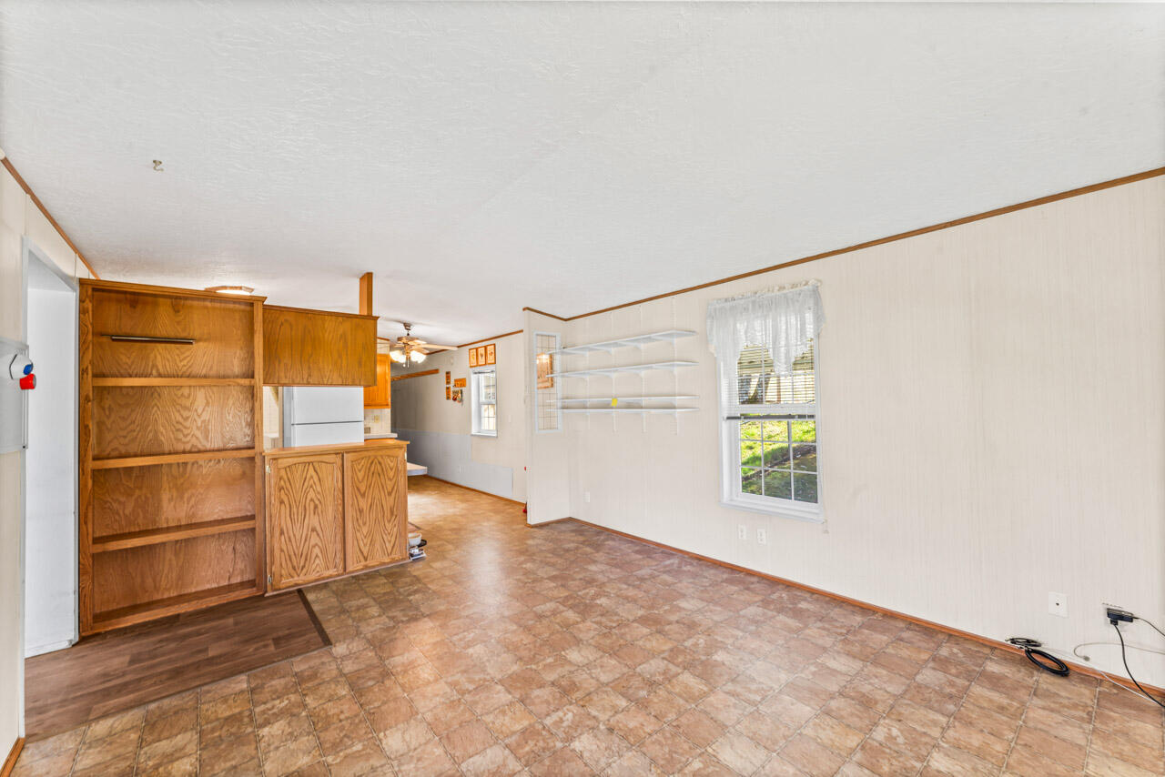 650 Three Pines Road Grants Pass, OR 97526 - Photo 17 of 48 a view of an empty room