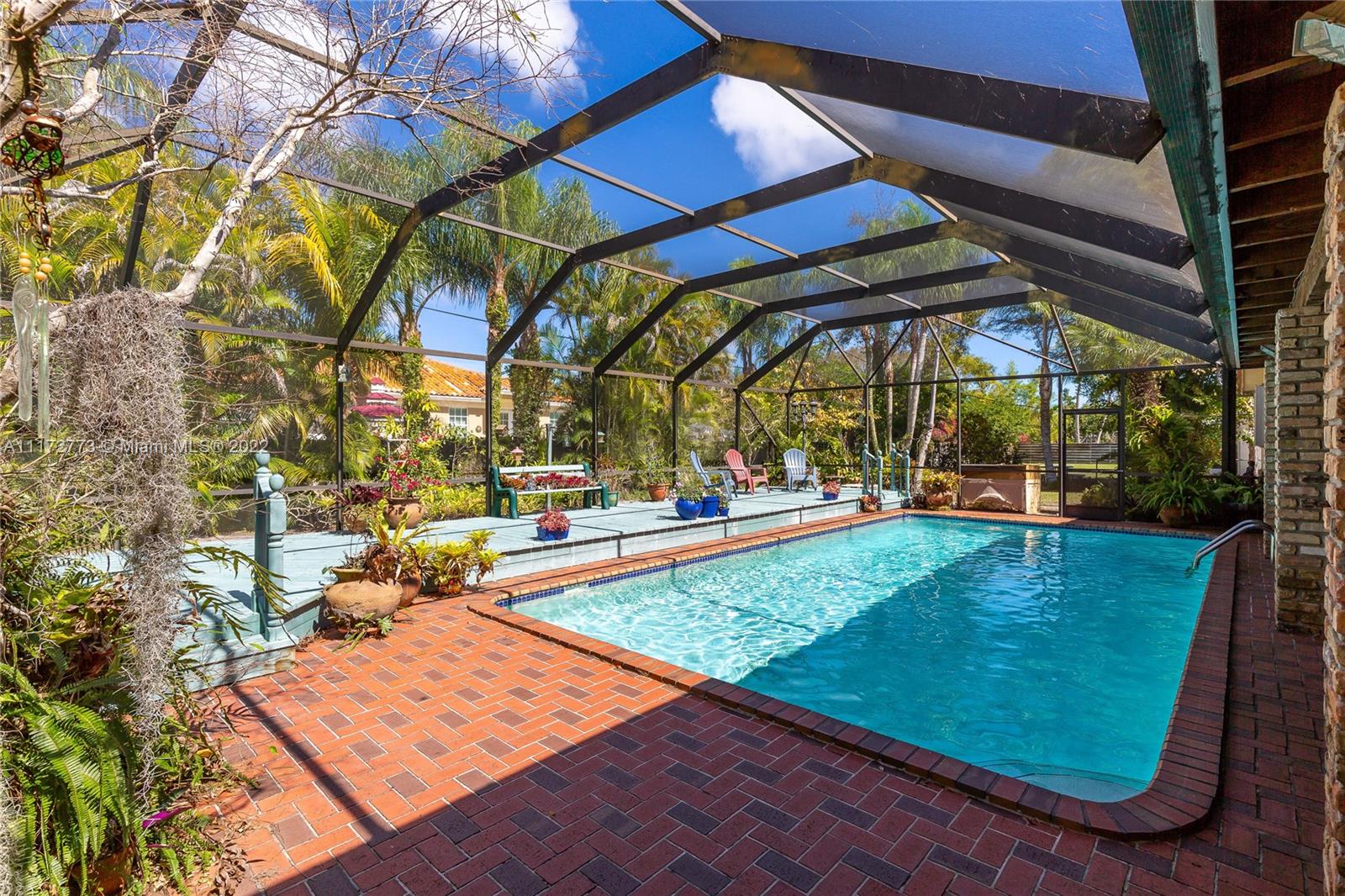 8695 Southwest 110th Street Miami, FL 33156 - Photo 18 of 54 a view of a backyard