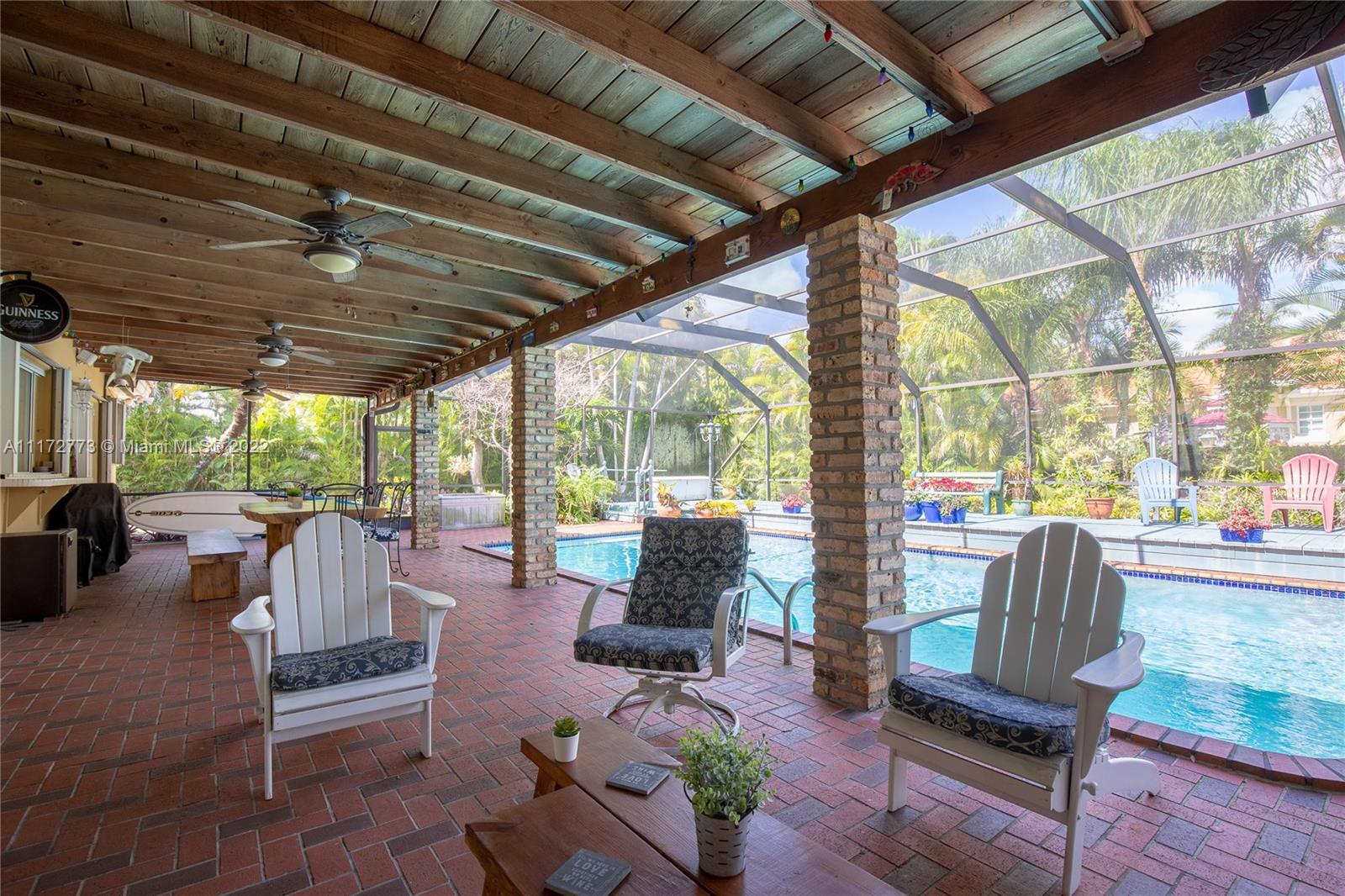 8695 Southwest 110th Street Miami, FL 33156 - Photo 24 of 54 a building outdoor space with patio furniture