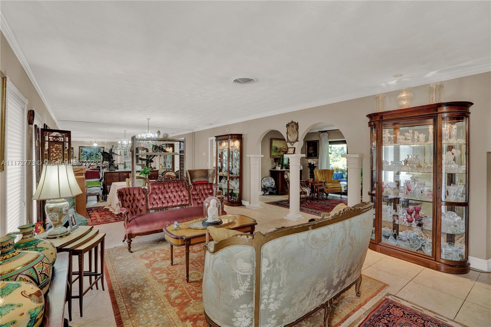 8695 Southwest 110th Street Miami, FL 33156 - Photo 41 of 54 a living room with furniture and wooden floor