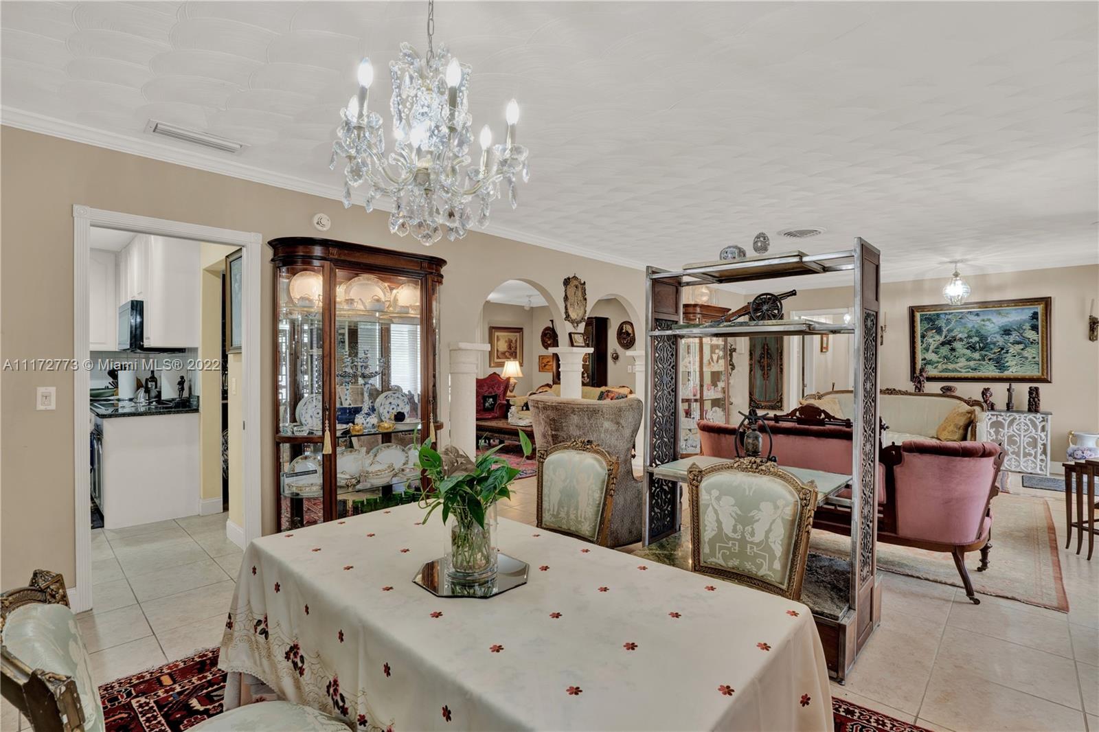 8695 Southwest 110th Street Miami, FL 33156 - Photo 43 of 54 a view of a dining room with furniture
