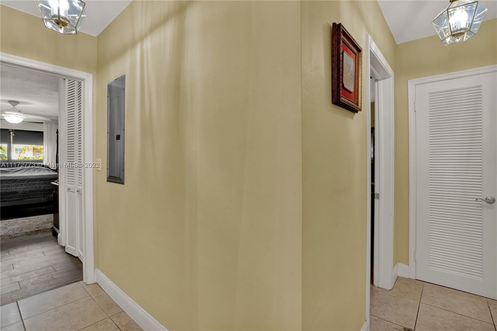 8695 Southwest 110th Street Miami, FL 33156 - Photo 50 of 54 a view of a hallway with front door