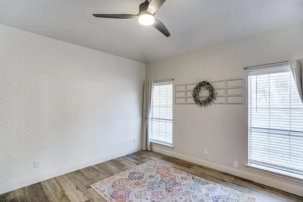 a view of an empty room and window