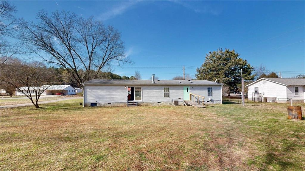 189 Boyd Valley Road Southeast Rome, GA 30161 - Photo 15 of 28 a house with a yard