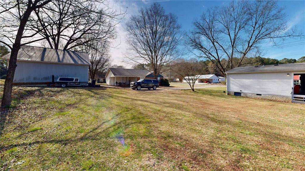 189 Boyd Valley Road Southeast Rome, GA 30161 - Photo 17 of 28 a view of a yard with a tree