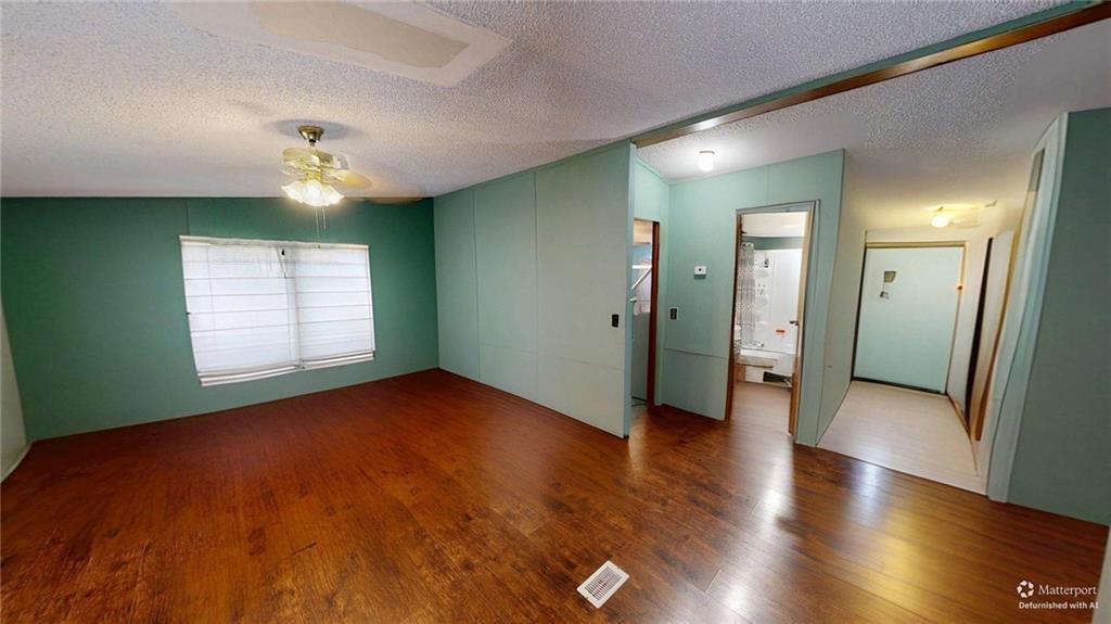 189 Boyd Valley Road Southeast Rome, GA 30161 - Photo 24 of 28 a view of an empty room with window and wooden floor