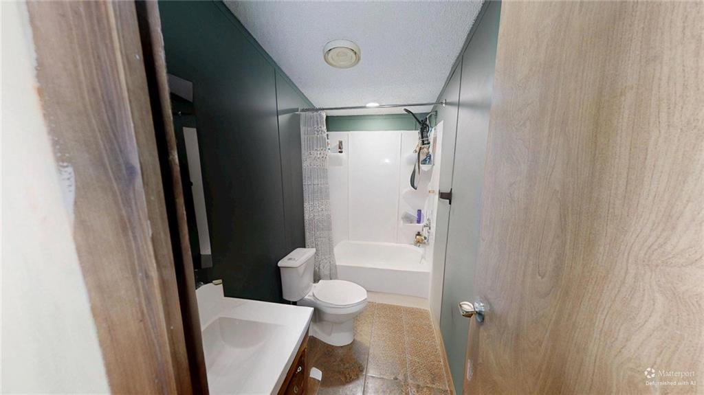 189 Boyd Valley Road Southeast Rome, GA 30161 - Photo 26 of 28 a bathroom with a shower and a toilet
