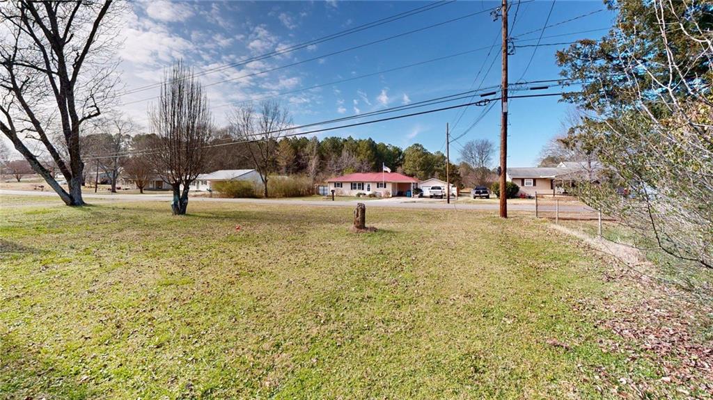 189 Boyd Valley Road Southeast Rome, GA 30161 - Photo 5 of 28 a view of a yard with a bench