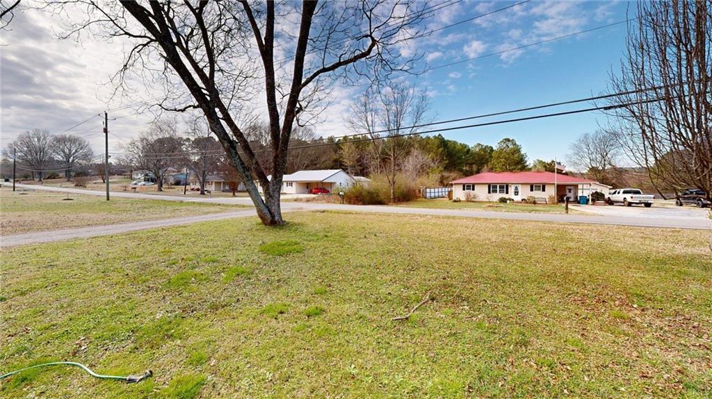 189 Boyd Valley Road Southeast Rome, GA 30161 - Photo 6 of 28 a view of yard with swimming pool and green space