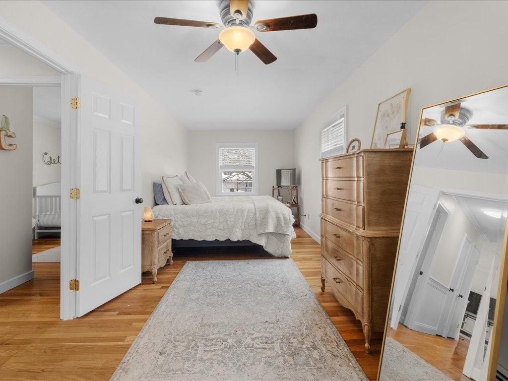7 Pierce Road Marshfield, MA 02050 - Photo 13 of 34 a bedroom with a bed and a large mirror