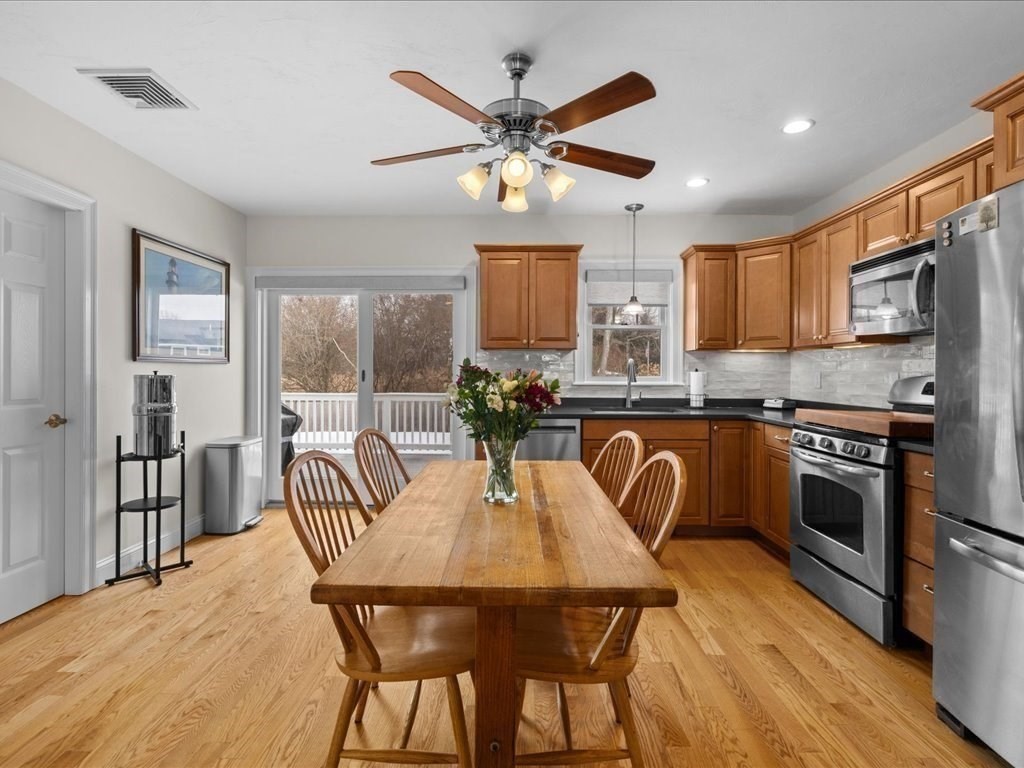 7 Pierce Road Marshfield, MA 02050 - Photo 21 of 34 a view of a dining room with furniture and wooden floor