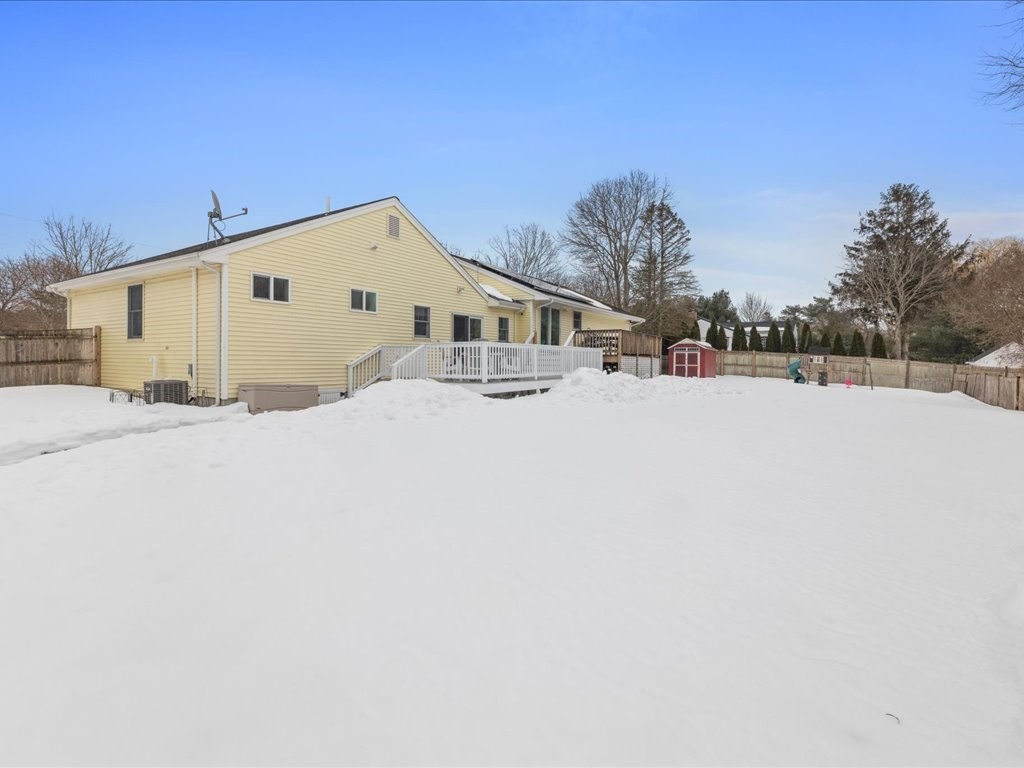 7 Pierce Road Marshfield, MA 02050 - Photo 32 of 34 a big house with a snow on the side of it