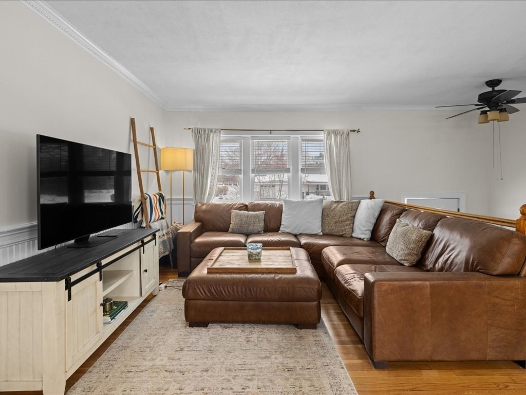 7 Pierce Road Marshfield, MA 02050 - Photo 6 of 34 a living room with furniture and a flat screen tv