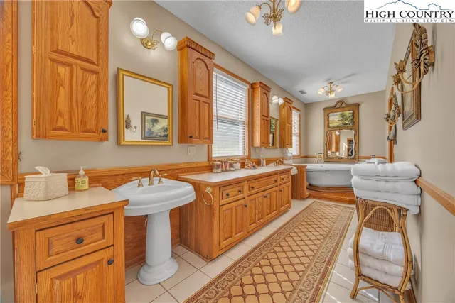 a bathroom with a sink and a bathtub