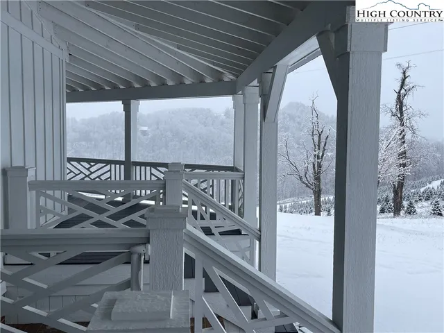 a view of balcony with wooden floor