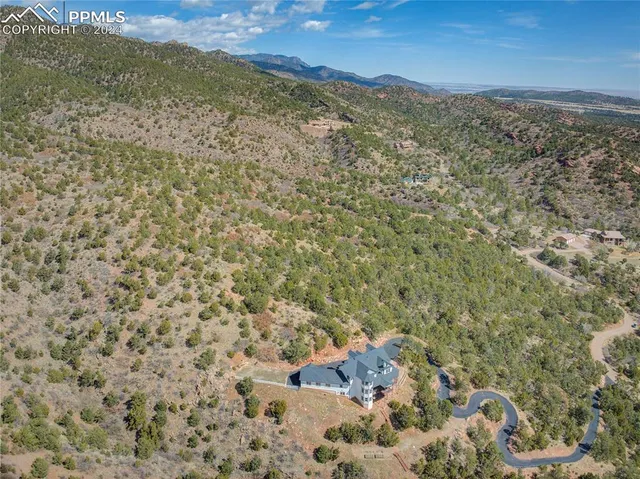 a view of a field with an outdoor space
