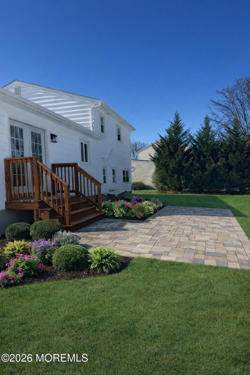 568 Flock Road Hamilton Square, NJ 08690 - Photo 15 of 65 a view of backyard with potted plants and wooden fence