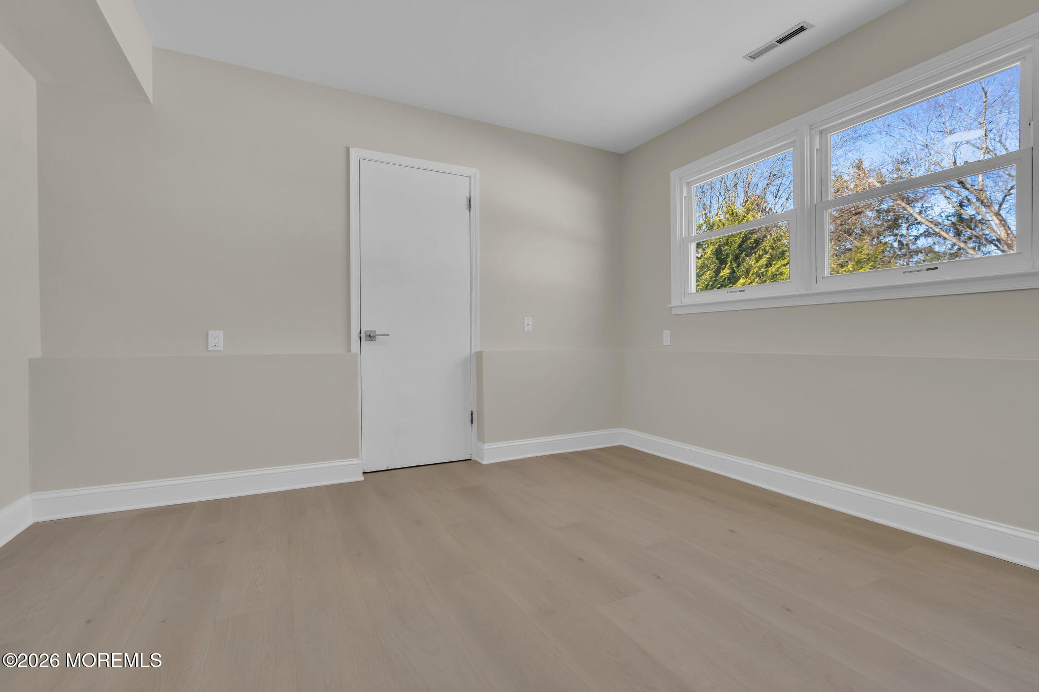 568 Flock Road Hamilton Square, NJ 08690 - Photo 16 of 65 an empty room with a window