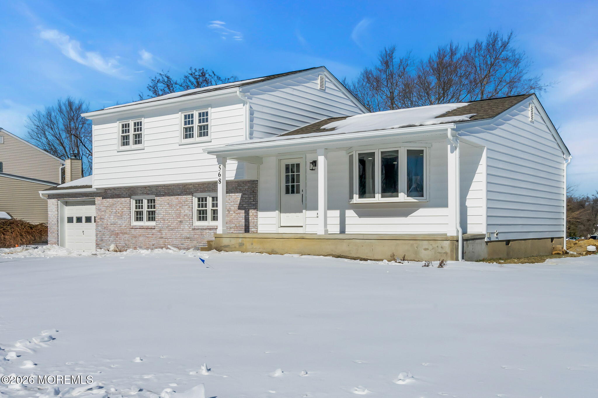 568 Flock Road Hamilton Square, NJ 08690 - Photo 26 of 65 a front view of a house with a yard and seating space