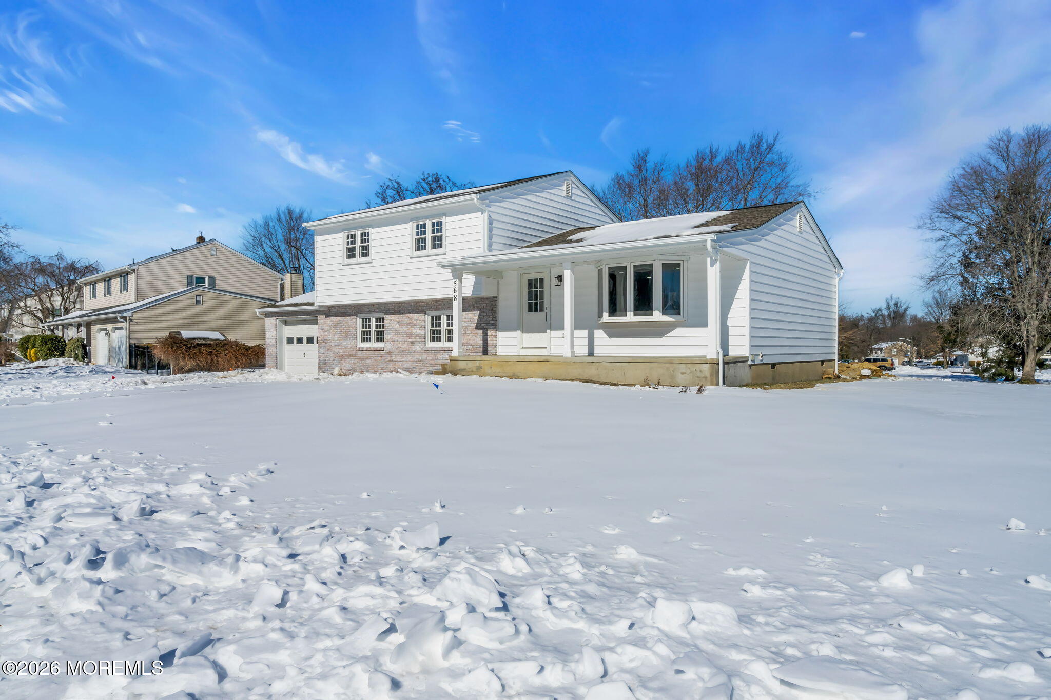 568 Flock Road Hamilton Square, NJ 08690 - Photo 28 of 65 a view of a house with a snow in the yard