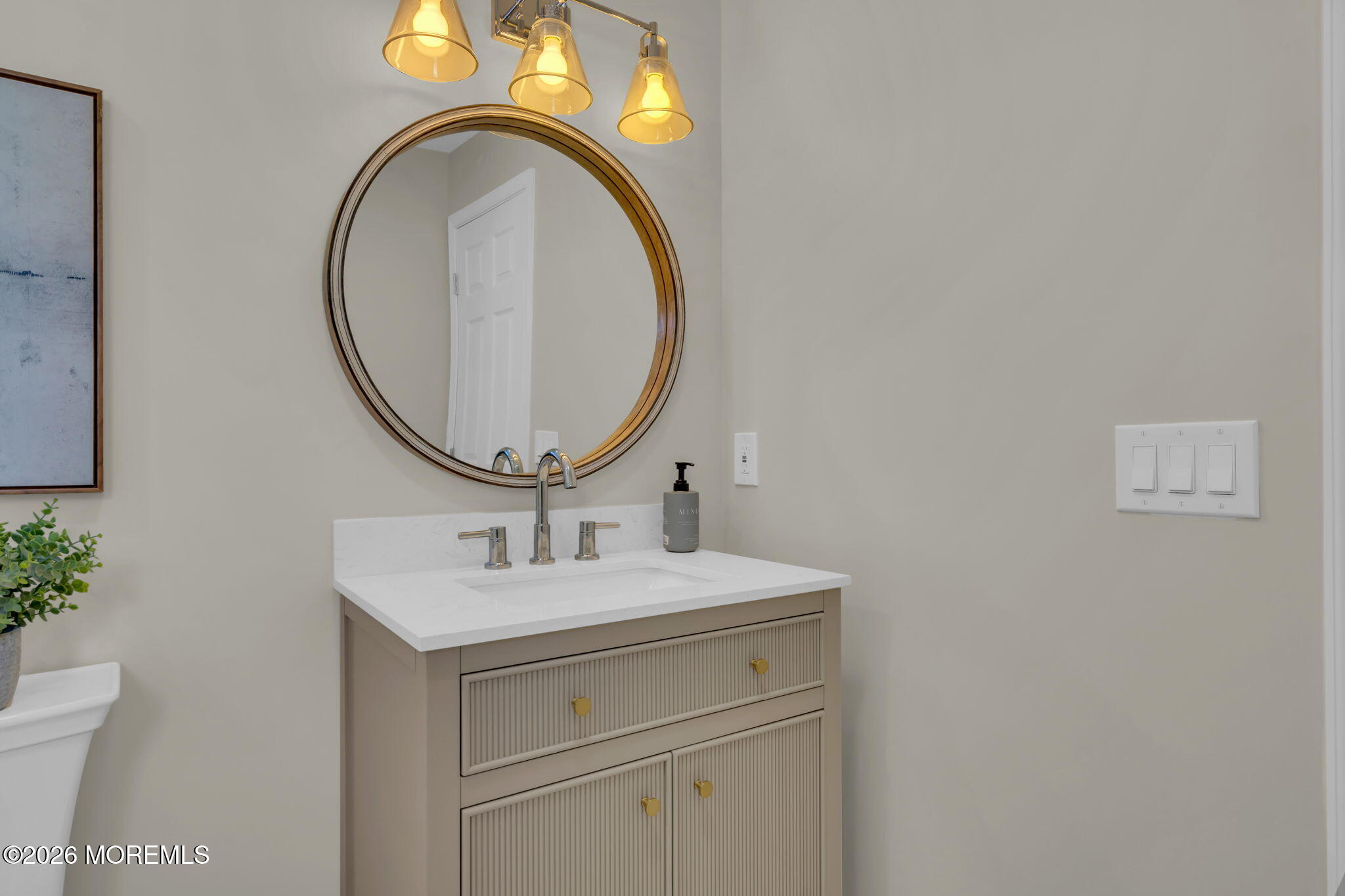 568 Flock Road Hamilton Square, NJ 08690 - Photo 3 of 65 a bathroom with a sink and a mirror
