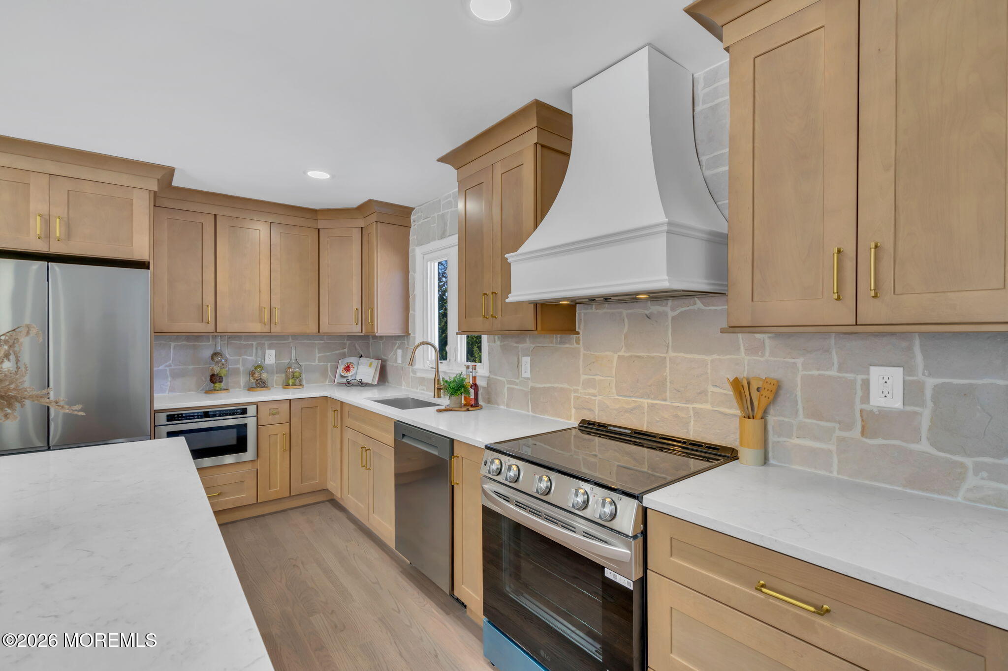 568 Flock Road Hamilton Square, NJ 08690 - Photo 40 of 65 a kitchen with a sink stove and cabinets