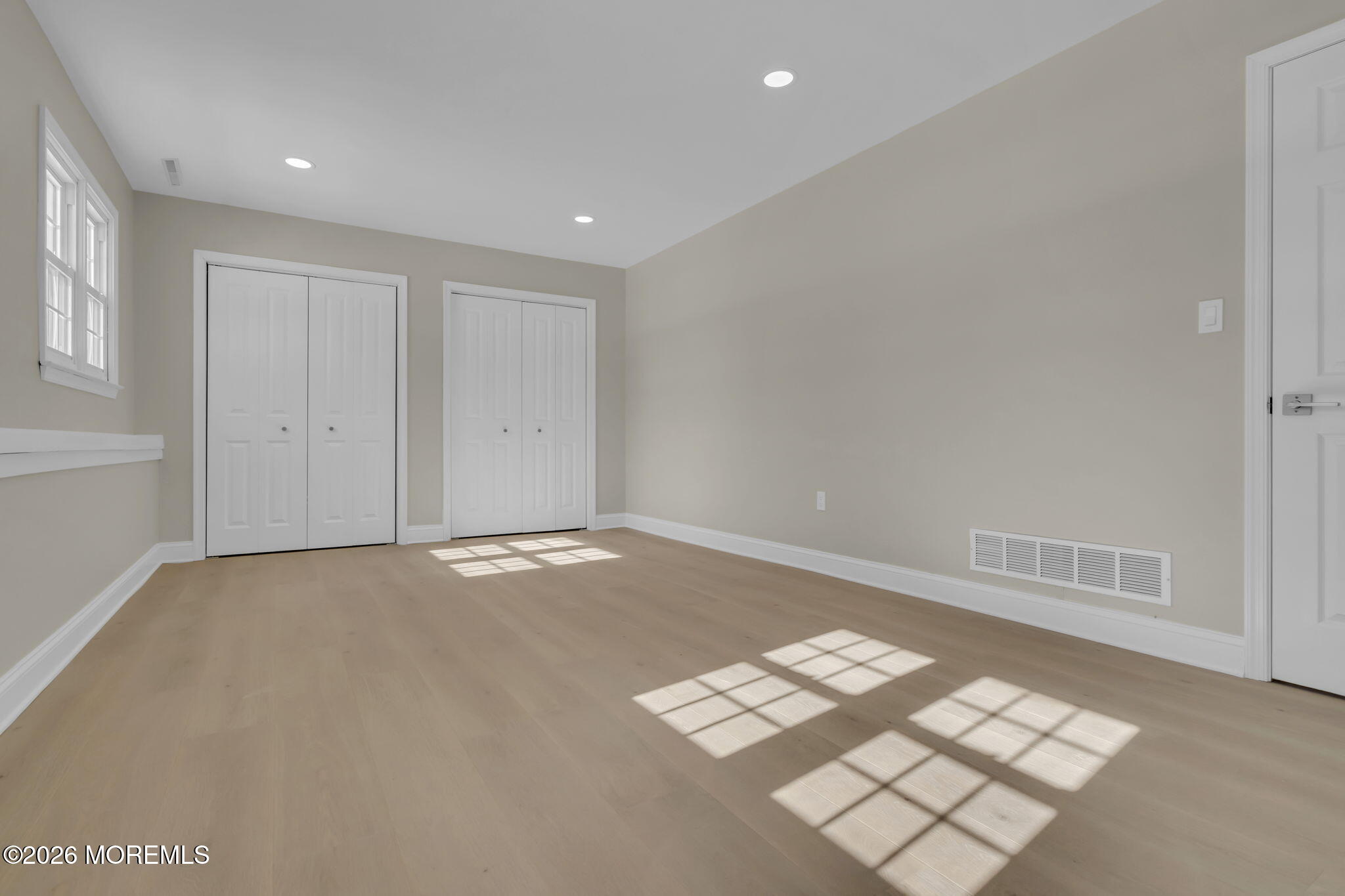 568 Flock Road Hamilton Square, NJ 08690 - Photo 6 of 65 an empty room with windows