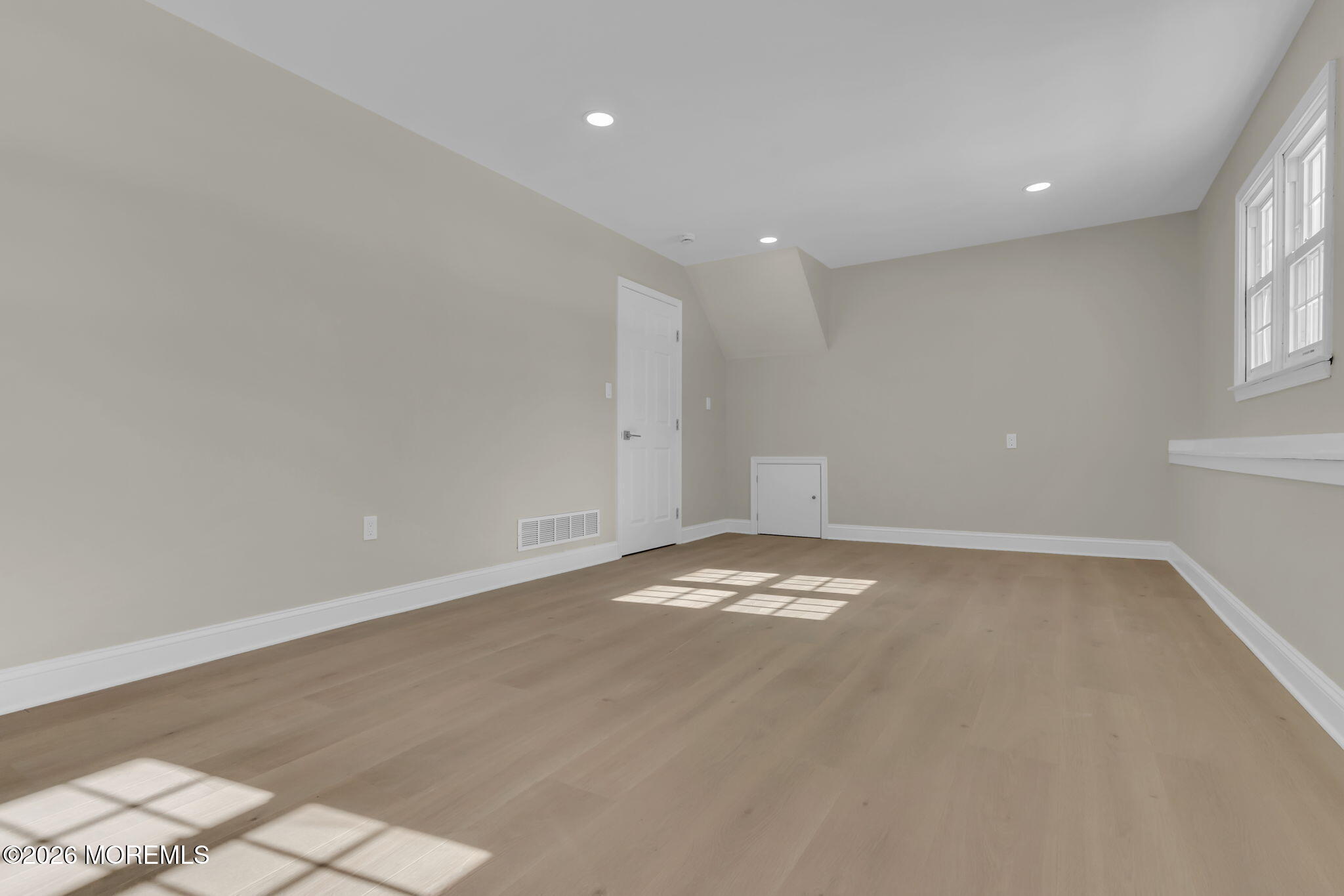 568 Flock Road Hamilton Square, NJ 08690 - Photo 7 of 65 a view of an empty room with a window