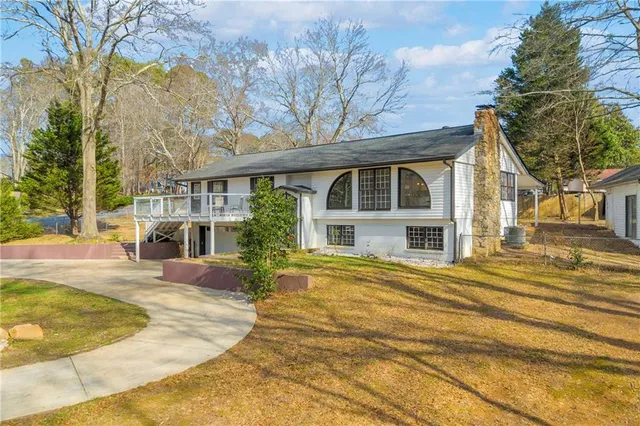 a view of a house with a swimming pool